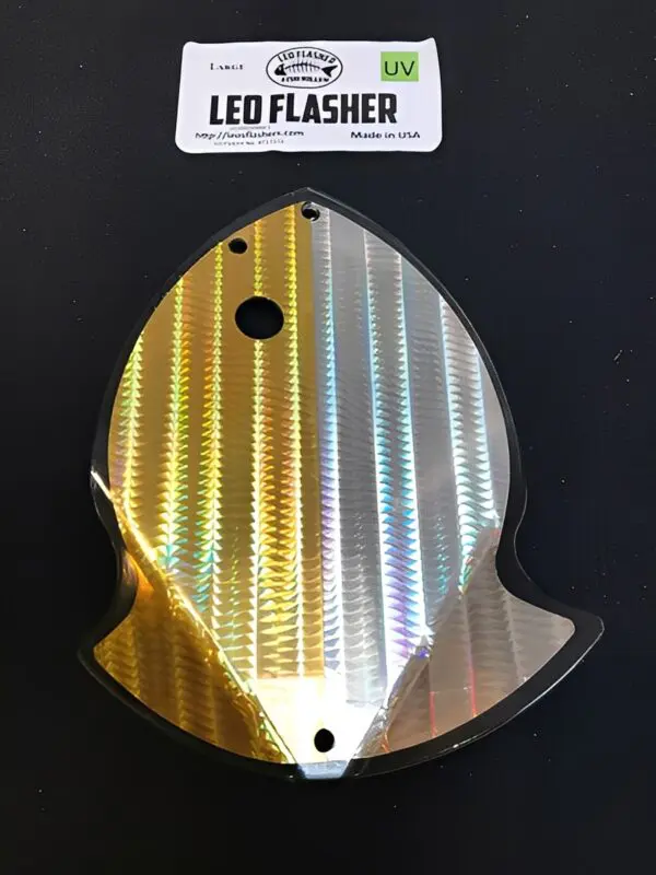 Holographic fish-shaped lure with label.