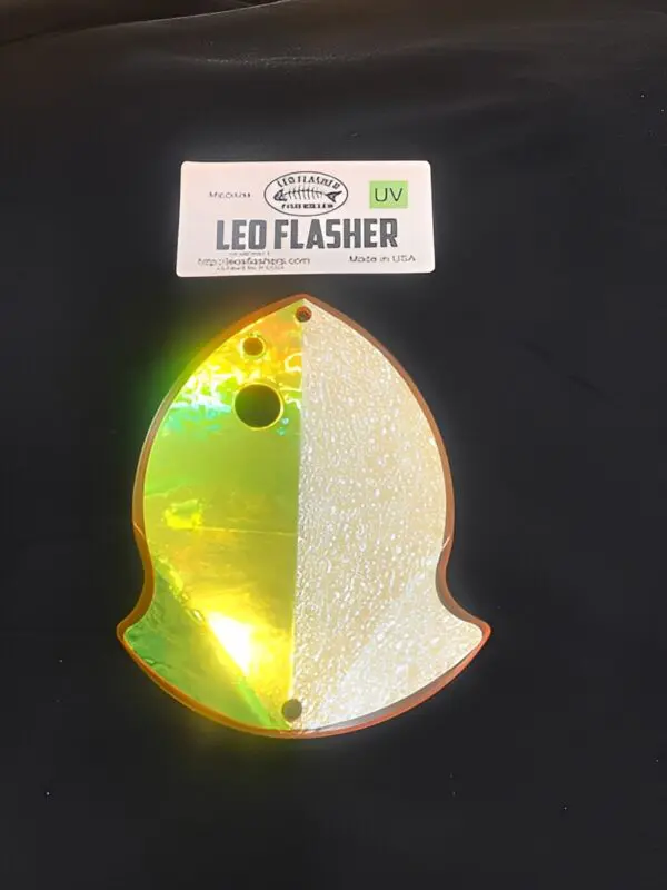 Fishing lure with label on black background.