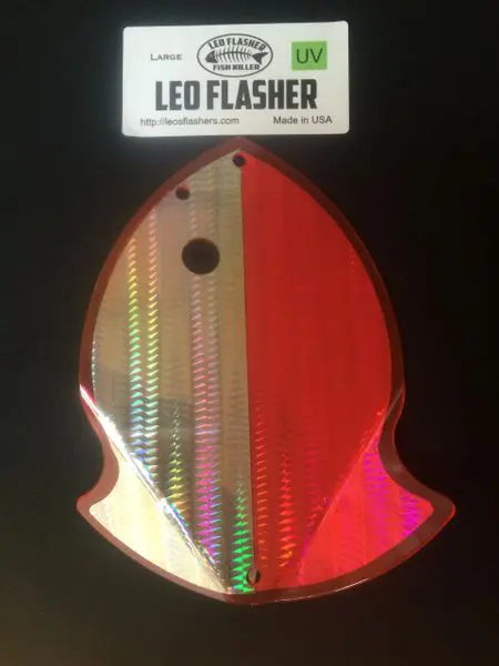 A red Snapchat ghost-shaped LED flasher keychain with holographic details.