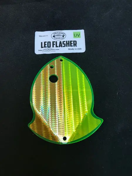 Green and gold fish-shaped LED flasher fishing lure.